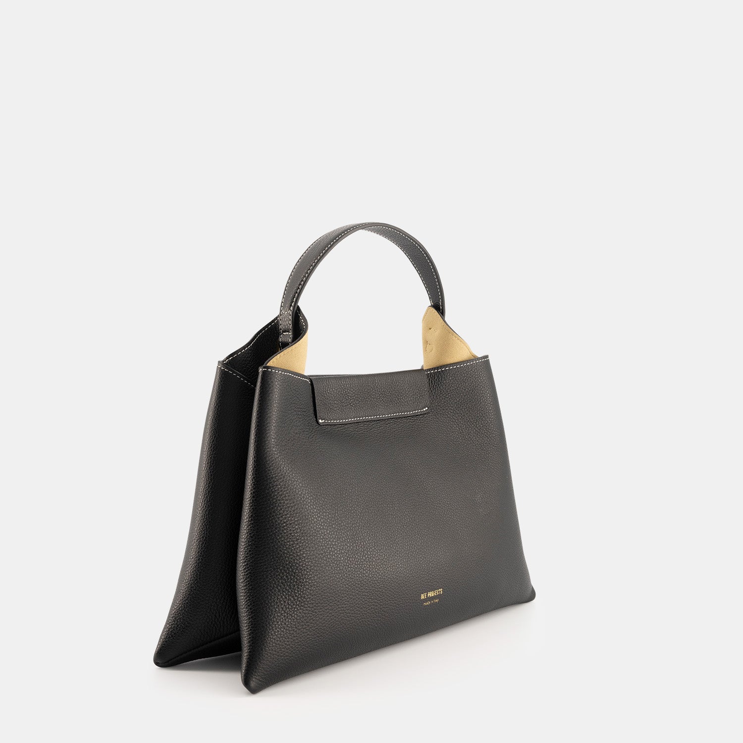 REE PROJECTS Elieze Medium Black Pebble Grain Soft Italian Leather Spacious Button Closure Top Handle Cross Body Strap Casual Elegant Functional Everyday