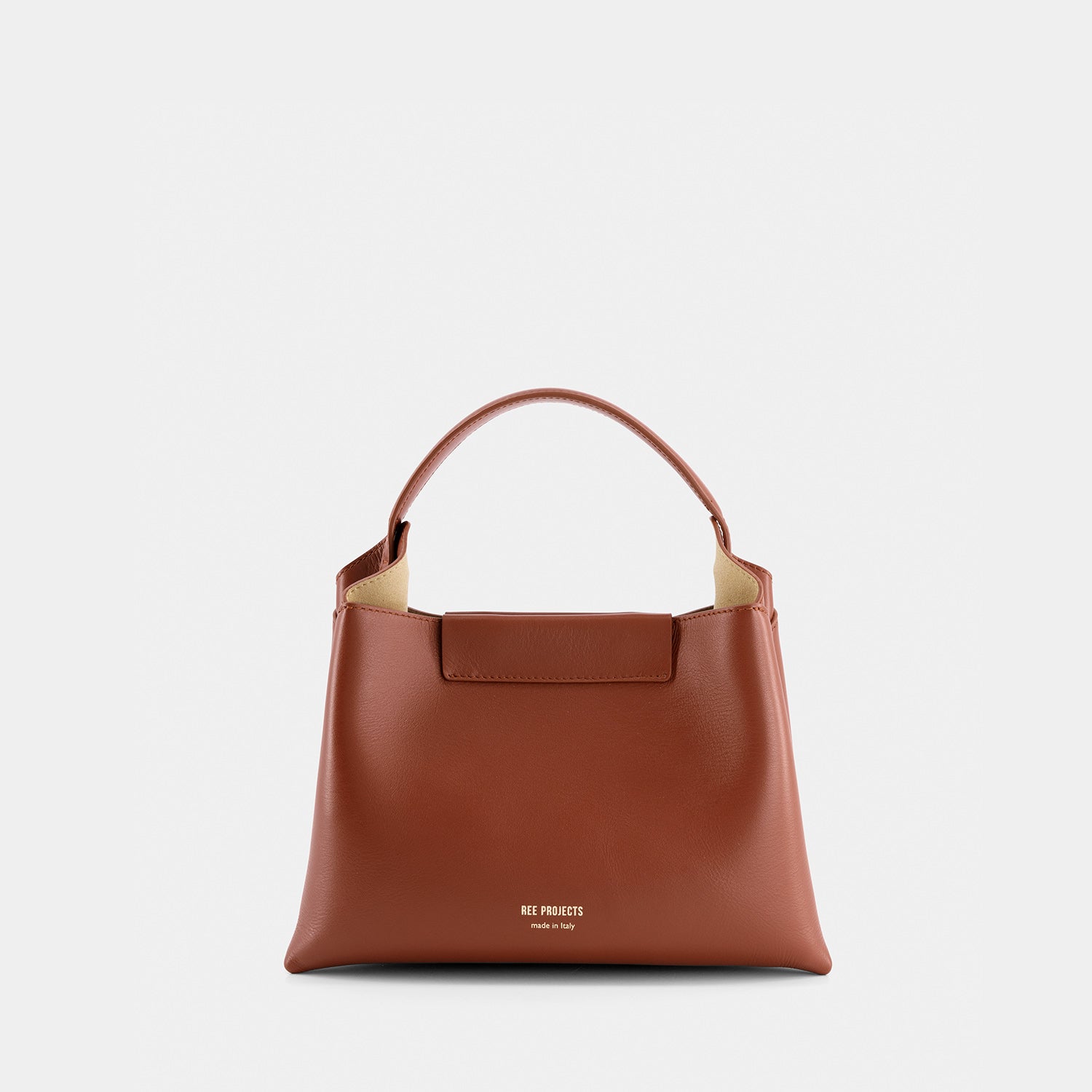 REE PROJECTS Elieze Mini Cognac Brown Soft Italian Leather Button Closure Top Handle Handbag Cross Body Strap Casual Elegant Functional Everyday Evening