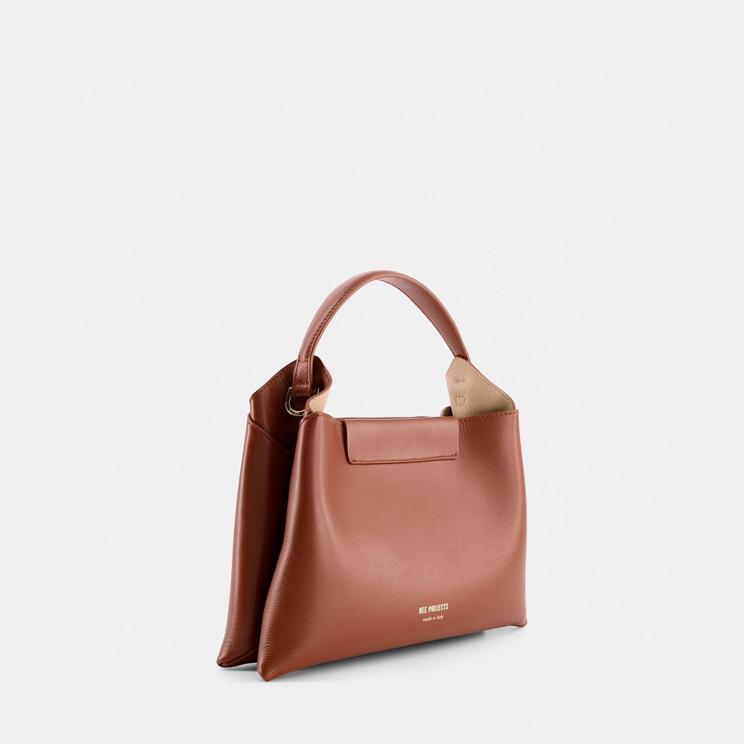 REE PROJECTS Elieze Mini Cognac Brown Soft Italian Leather Button Closure Top Handle Handbag Cross Body Strap Casual Elegant Functional Everyday Evening